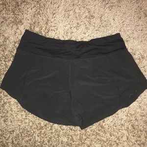 Black lulu lemon shorts with little dot pattern